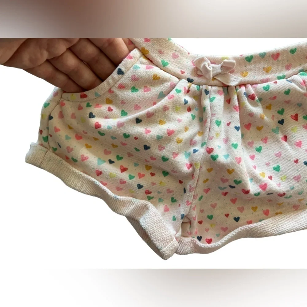 Gap, 6-12M pink shorts w/hearts but runs larger, front pockets